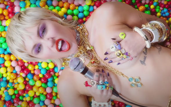 Miley Cyrus shares self-directed video for massive new disco anthem Midnight  Sky